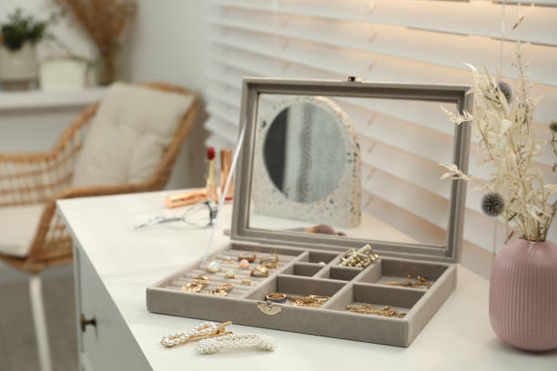 istock Elegant jewelry box with beautiful bijouterie on commode indoors 1445192951