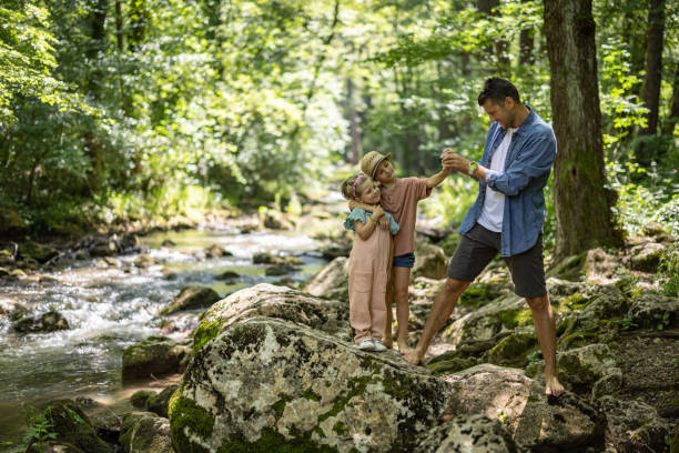 istock Happy family taking selfie in nature 1445192970