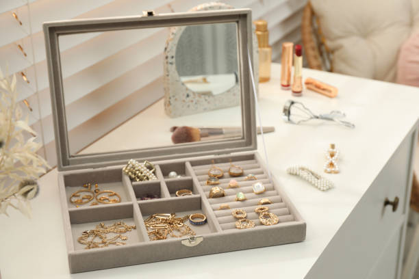 istock Elegant jewelry box with beautiful bijouterie on commode indoors 1445193025