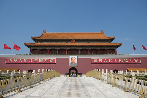 Beijing,China-September 16th 2022: facade of Tiananmen gate on sunny day with portrait of Mao Zedong. A monumental gate in the city center of Beijing