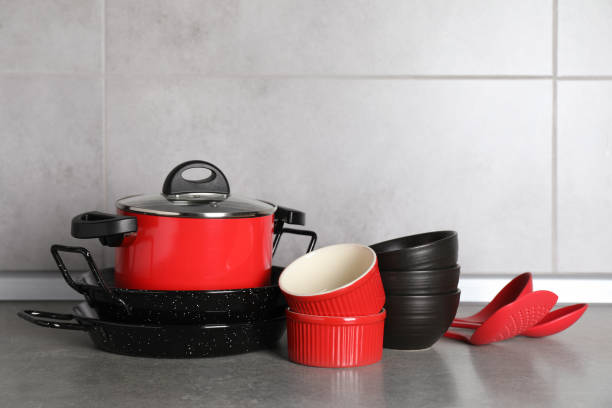 istock Set of different cooking utensils on grey countertop in kitchen 1445196869