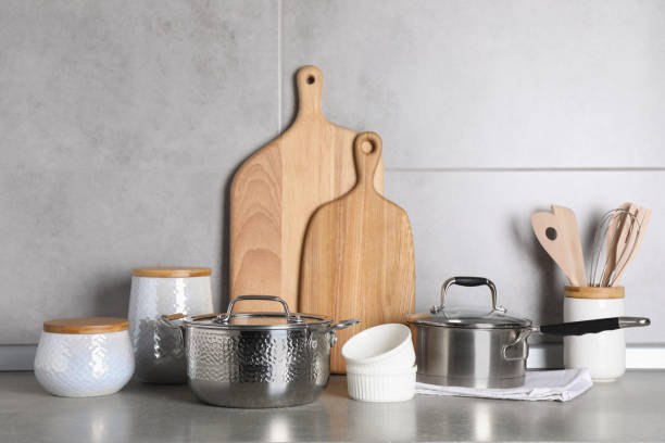 istock Set of different cooking utensils on grey countertop in kitchen 1445196908