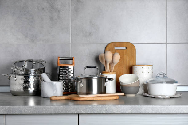 istock Set of different cooking utensils on grey countertop in kitchen 1445196937