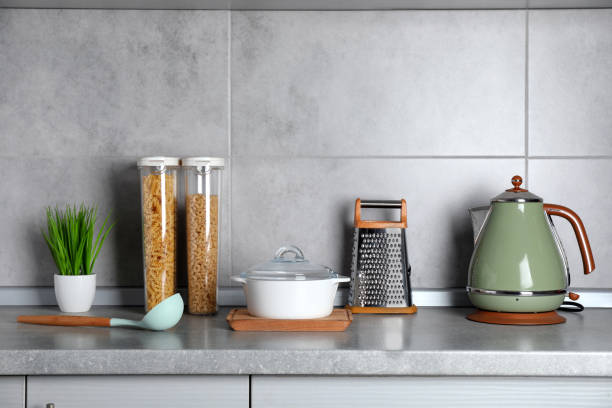 istock Set of different cooking utensils on grey countertop in kitchen 1445196951
