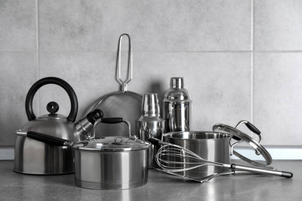 istock Set of different cooking utensils on grey countertop in kitchen 1445197454