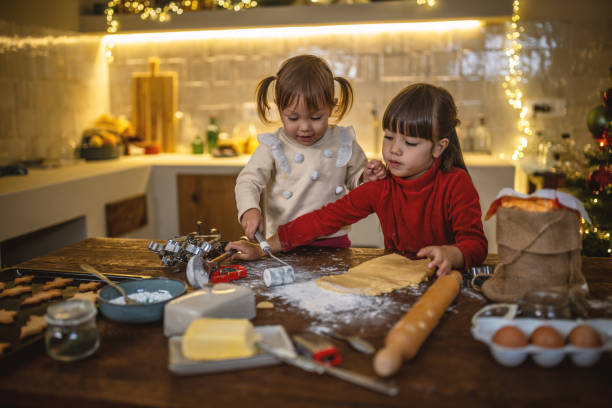 istock Girls baking christmas cookies 1445197955