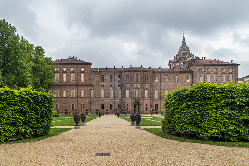 Turin, Italy - 05-06-2022: Wide angle view of the beautiful gardens of the Royal Palace of  Turin