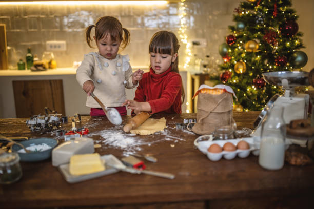 istock Girls baking christmas cookies 1445198889