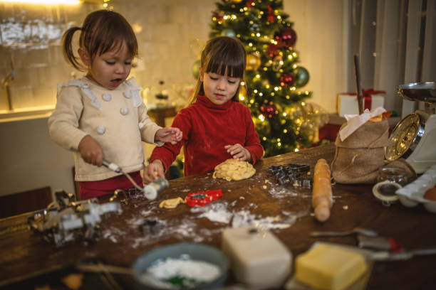 istock Girls baking christmas cookies 1445199601