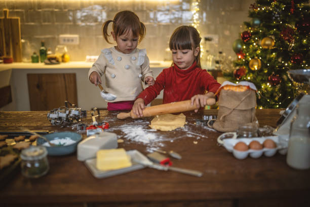 istock Girls baking christmas cookies 1445199795