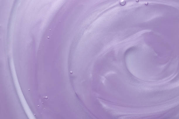 istock Sample of violet shower gel on white background, closeup 1445199954