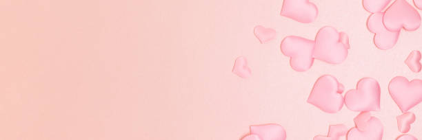 istock Banner with textile hearts confetti on a pink background. 1445200049