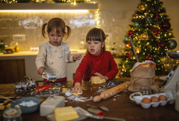 istock Girls baking christmas cookies 1445200927