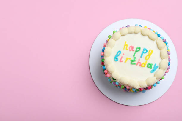 istock Cute bento cake with tasty cream on pink background, top view. Space for text 1445202035