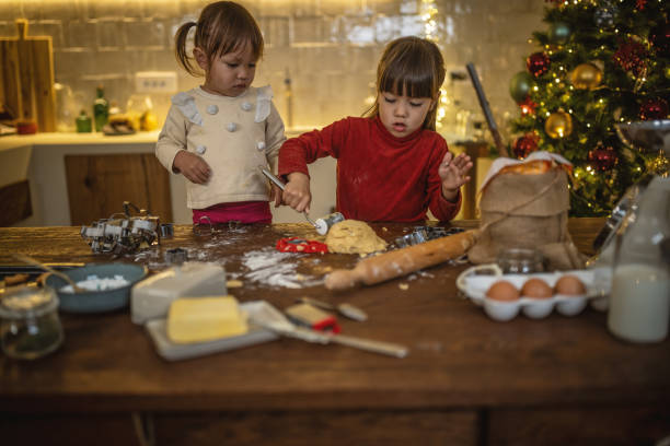 istock Girls baking christmas cookies 1445202064