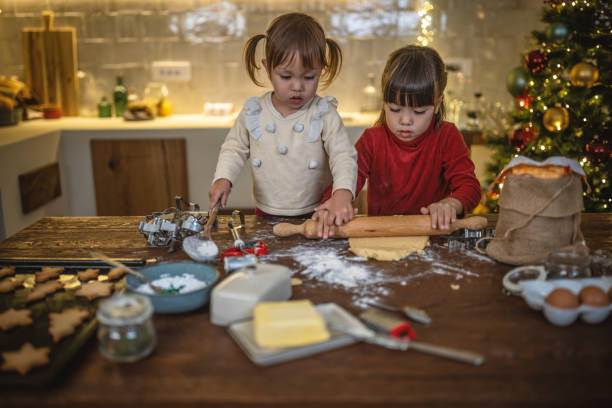 istock Girls baking christmas cookies 1445202170