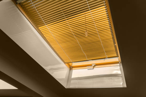 istock mansard roof window with shutter blinds. 1445202853