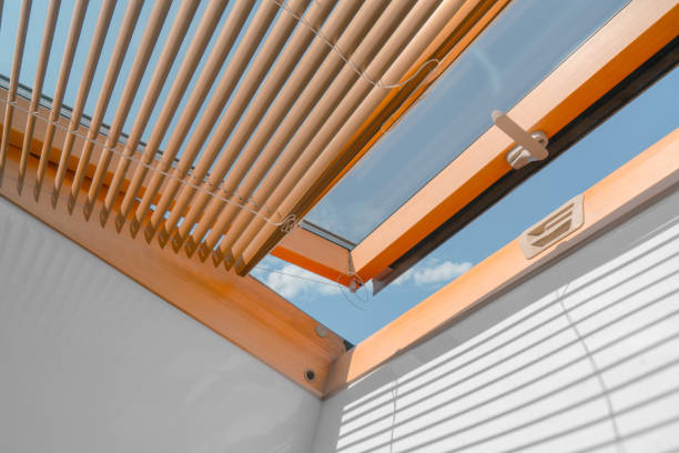 istock mansard roof window with shutter blinds. 1445202869