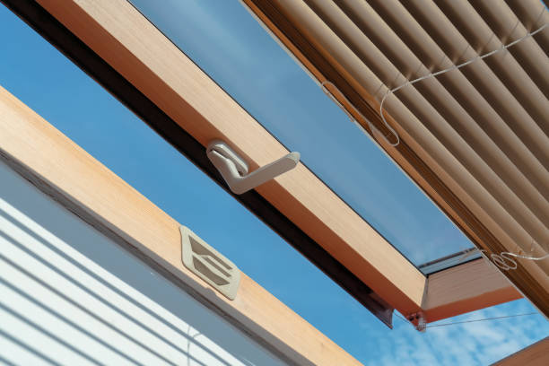 istock mansard roof window with shutter blinds. 1445202873
