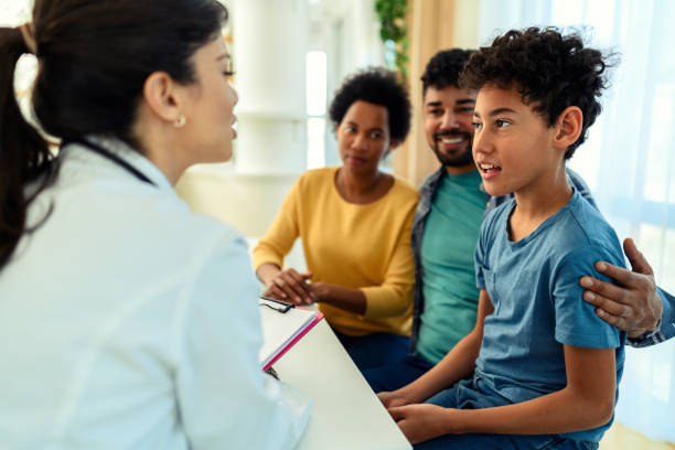 istock Black boy having a medical exam at doctor's office 1445202965