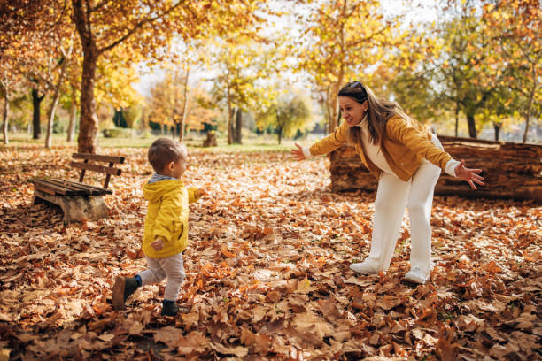 istock Mom and son in park 1445203292