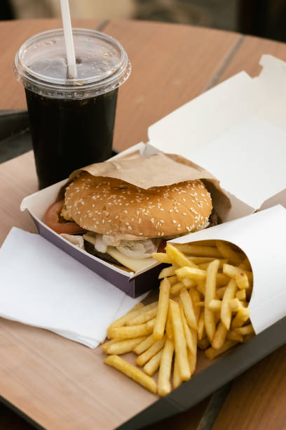istock Outdoors fastfood lunch. Burger and fries. 1445203685
