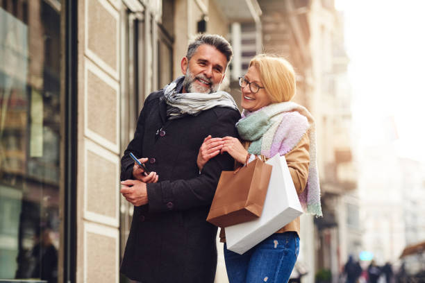 istock Senior couple enjoying walking outside 1445204111