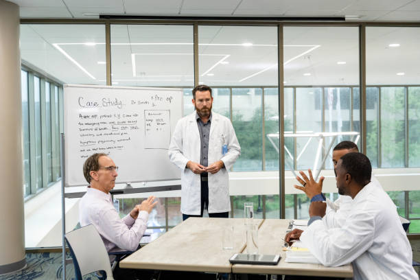 istock Healthcare professionals meet 1445205327