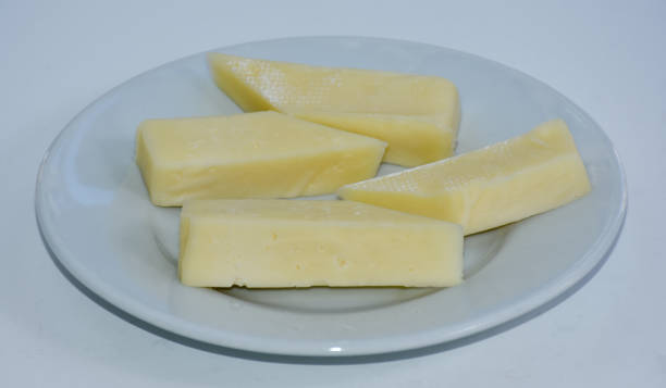 istock Greek feta cheese cut on white dish 1445207287