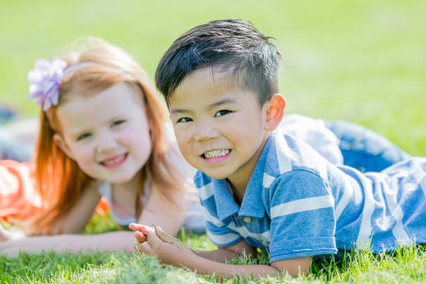 istock Preschool Children in the Grass 1445210859