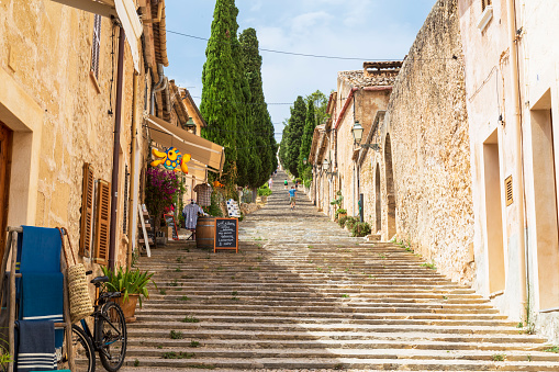 Pollença, Spain, July 20, 2018; The Pollença staircase with 365 steps in the charming village in the north of the Mediterranean island of Mallorca in Spain.