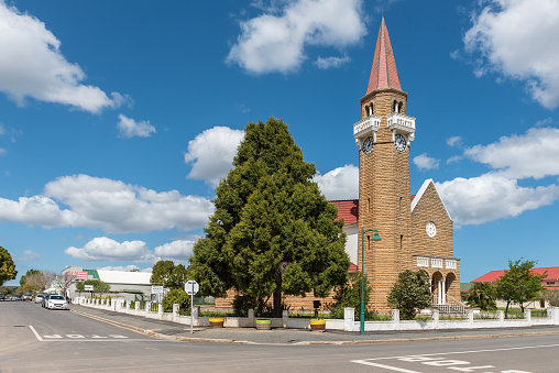 Stanford, South Africa - Sep 20, 2022: A street scene in Stanford in the Western Cape Province. The Dutch Reformed Church and a supermarket are visible