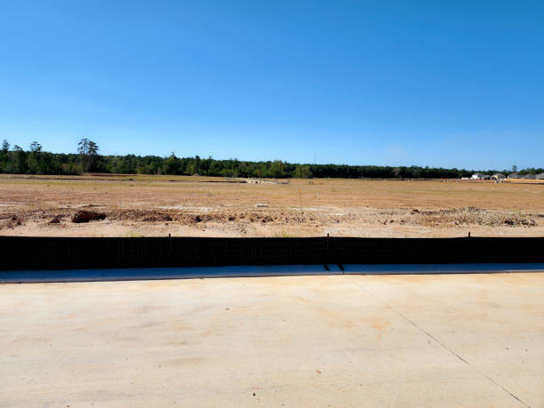 istock Blue Collar - Cleared land ready for new home construction. 1445217402