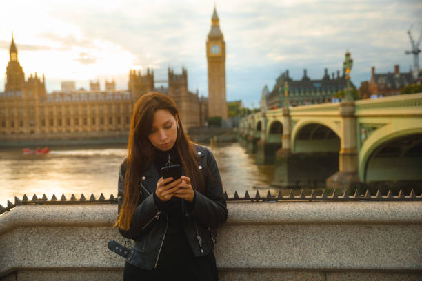 istock Woman using smartphone in London 1445219917