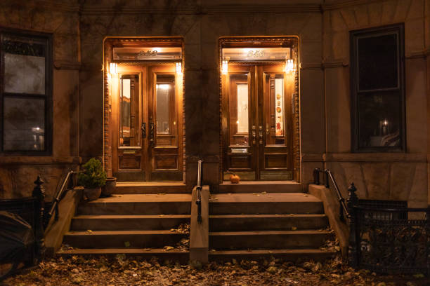 Brooklyn, NY, USA, Nov. 28, 2022: entrance to  row houses at night in Brooklyn, NY, USA