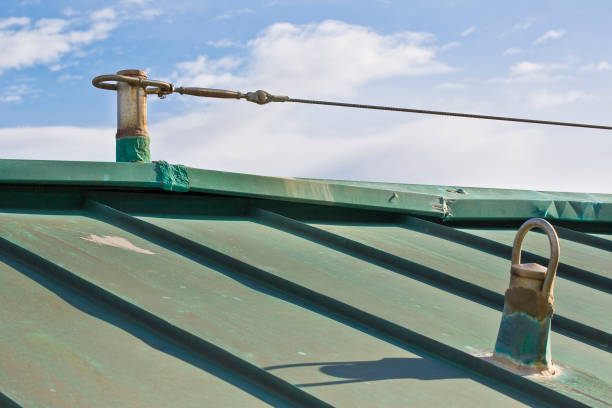 istock Horizontal lifeline fall protection system with inox stainless steel cable on copper roof used to prevent the danger of falling 1445232669