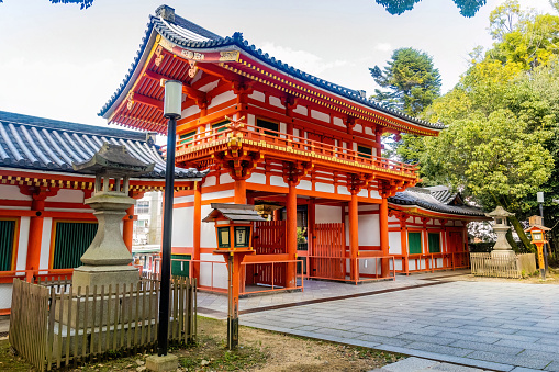 Kyoto, Japan - October 17, 2022: Scenic view of red entrance gates of Yasaka Shrine. Translation: Waman Lantern Festival