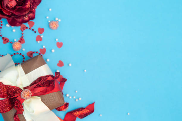 istock Blue background for Valentine's Day with decor details, flat lay. 1445241050