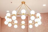 Light fixture with all the balls on the ceiling. beautiful chandelier