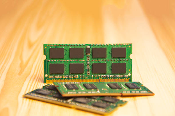 istock ddr3 type ram Old laptop on wooden floor 1445248141