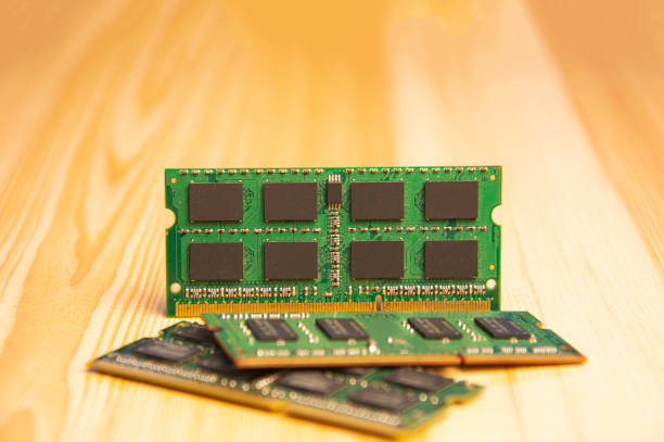 ddr3 type ram Old laptop on wooden floor ddr3 type ram Old laptop on wooden floor installing laptop ram stock pictures, royalty-free photos & images