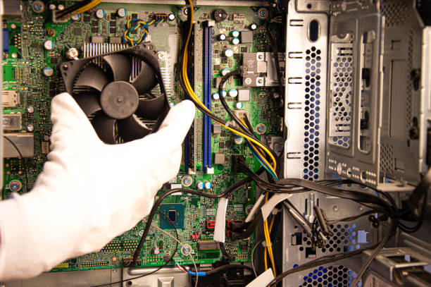 istock top view mechanic repairing computer 1445248195
