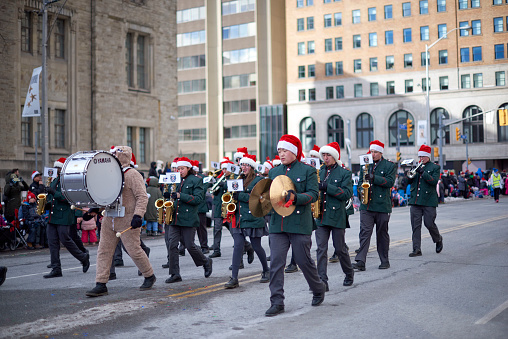 Toronto, Ontario, Canada- November 20th, 2022: De La Salle College marching band in Toronto’s annual Santa Claus Parade.