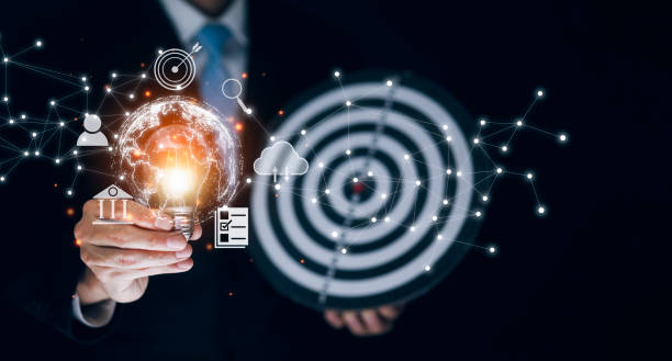 istock thinking and creative concept, Close up the light bulb and man working on the desk, Creativity, and innovation are keys to success,  new idea and innovation with Brain and light bulbs,big data 1445251058
