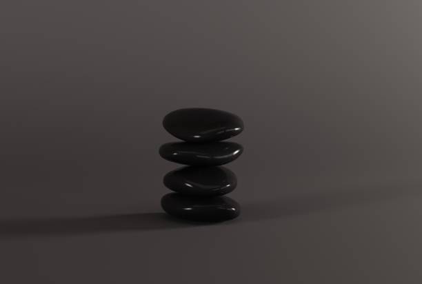 istock Black decorative stones on a dark background. 1445255265