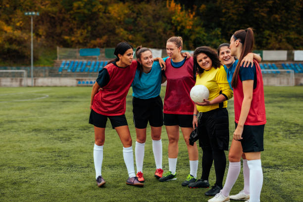 istock Soccer girls talking in huddle. 1445260883