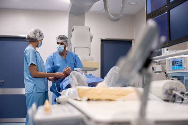 istock Surgeons talking about a medical procedure in the hemodynamics room 1445262085