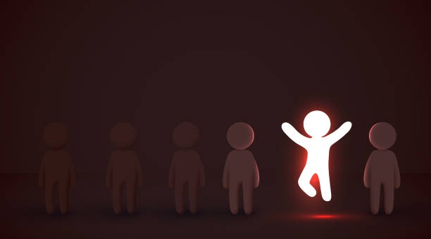 istock Stand out from the crowd. One glowing light man jumping with arms wide open among other people. Leadership, innovation, great idea and individuality concepts. 1445262534