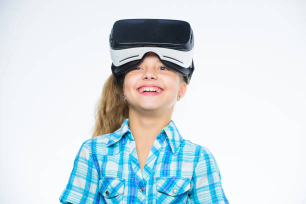 istock Girl cute child with head mounted display on white background. Virtual reality concept. Virtual education for school pupil. Happy kid use modern technology virtual reality. Get virtual experience 1445263766