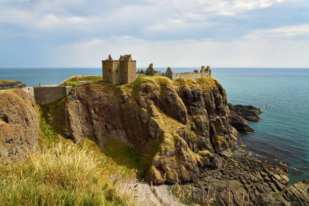 istock Dunnottar Castle is perched on the cliff 1445263938